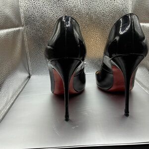 Christian Louboutin “Red bottoms”